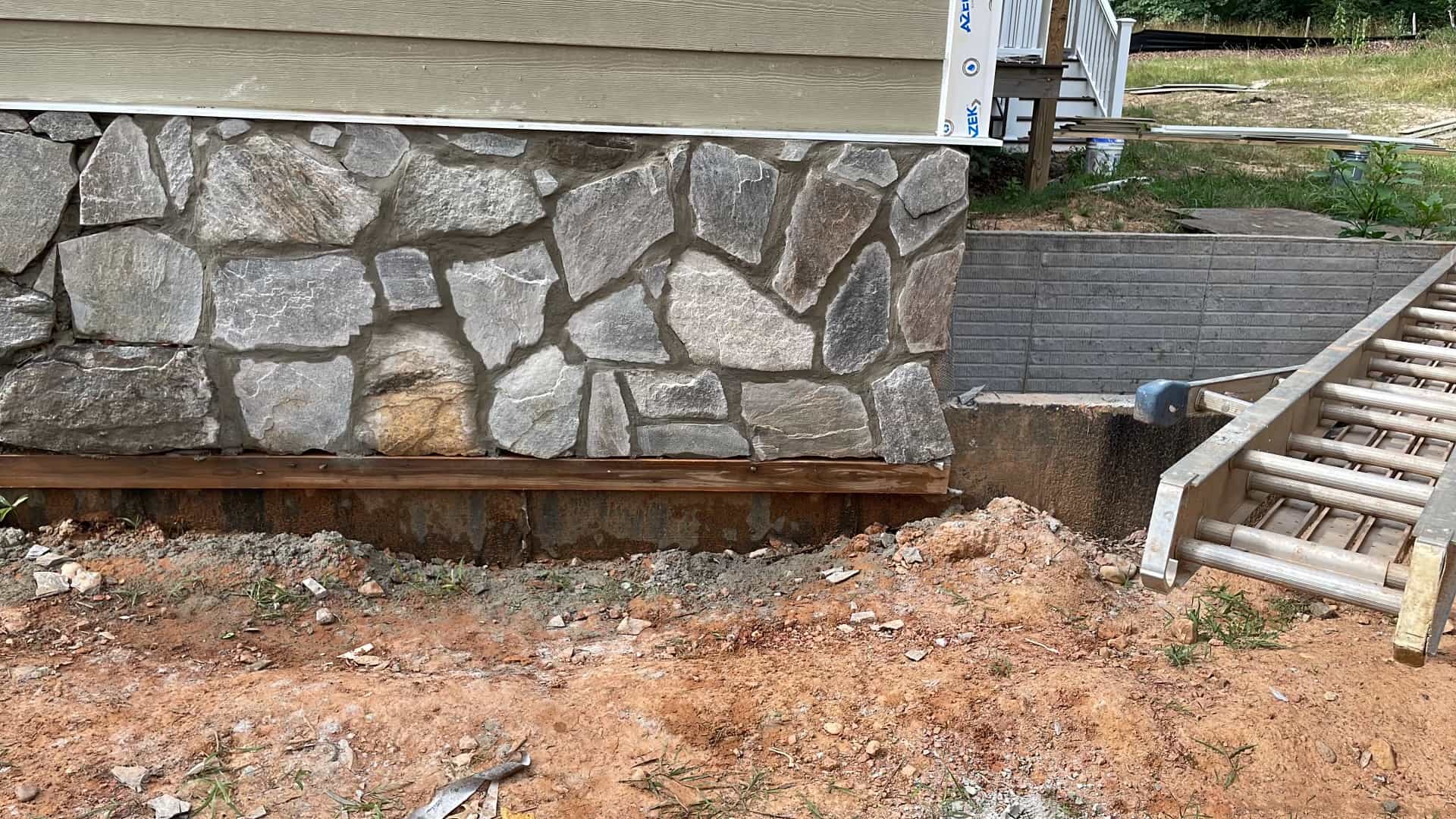 Stone veneer foundation detail on home exterior